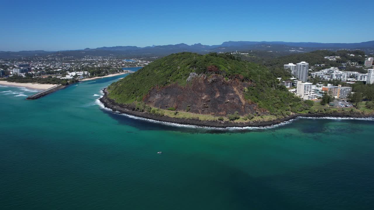 Burned Forests Of Burleigh Head National Park On The Gold Coast In South East Queensland, Australia. Aerial Pullback Shot