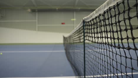 Pelotas-De-Tenis-Saltando-La-Red