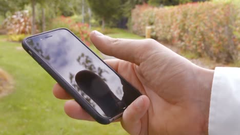 close up of man using a smartphone