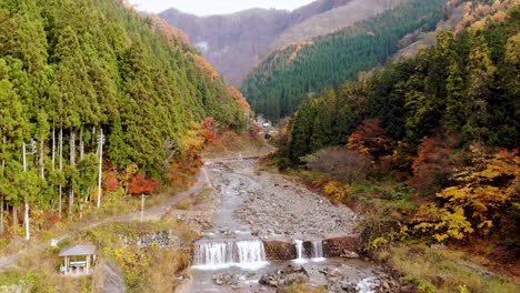 Aerial-Drone-view-through-mountains-of-Japan-in-Autumn-1