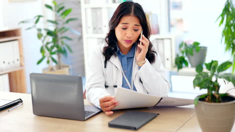 Doctor,-woman-and-phone-call-for-healthcare-report