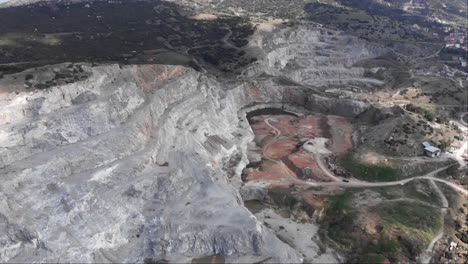 High-altitude-aerial-view-old-abandoned-quarry-cloudy-day