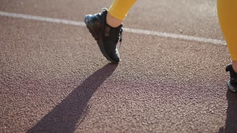 woman running on a track