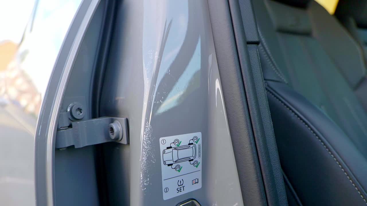 Paint on SUV car door shut - close up - orbit left to right