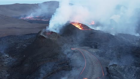 aerial at erupting geldingadalsgos volcano with dark basalt rock in iceland