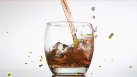 animation of confetti over glass of white alcohol on white background