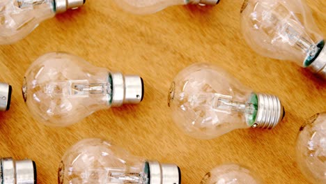 Light-bulbs-on-wooden-table