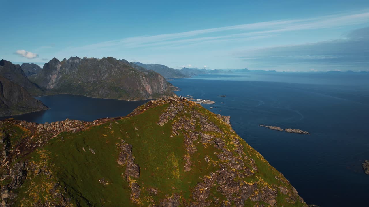 Reinebringen viewpoint, Lofoten Islands in summer. Arctic sea, coastal landscape. Norway aerial drone.