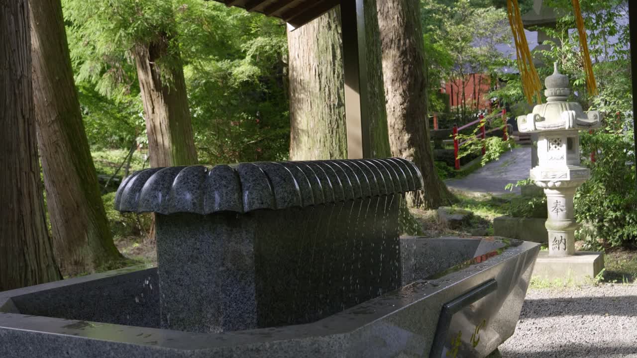 Perfect slow motion shot over Japanese shrine scenery