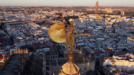 giraldillo sculpture  atop the giralda, seville; close-up aerial