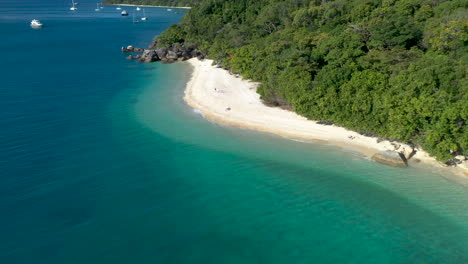 Cinematic-drone-shot-towards-a-beautiful-beach-on-Fitzroy-Island-in-Australia