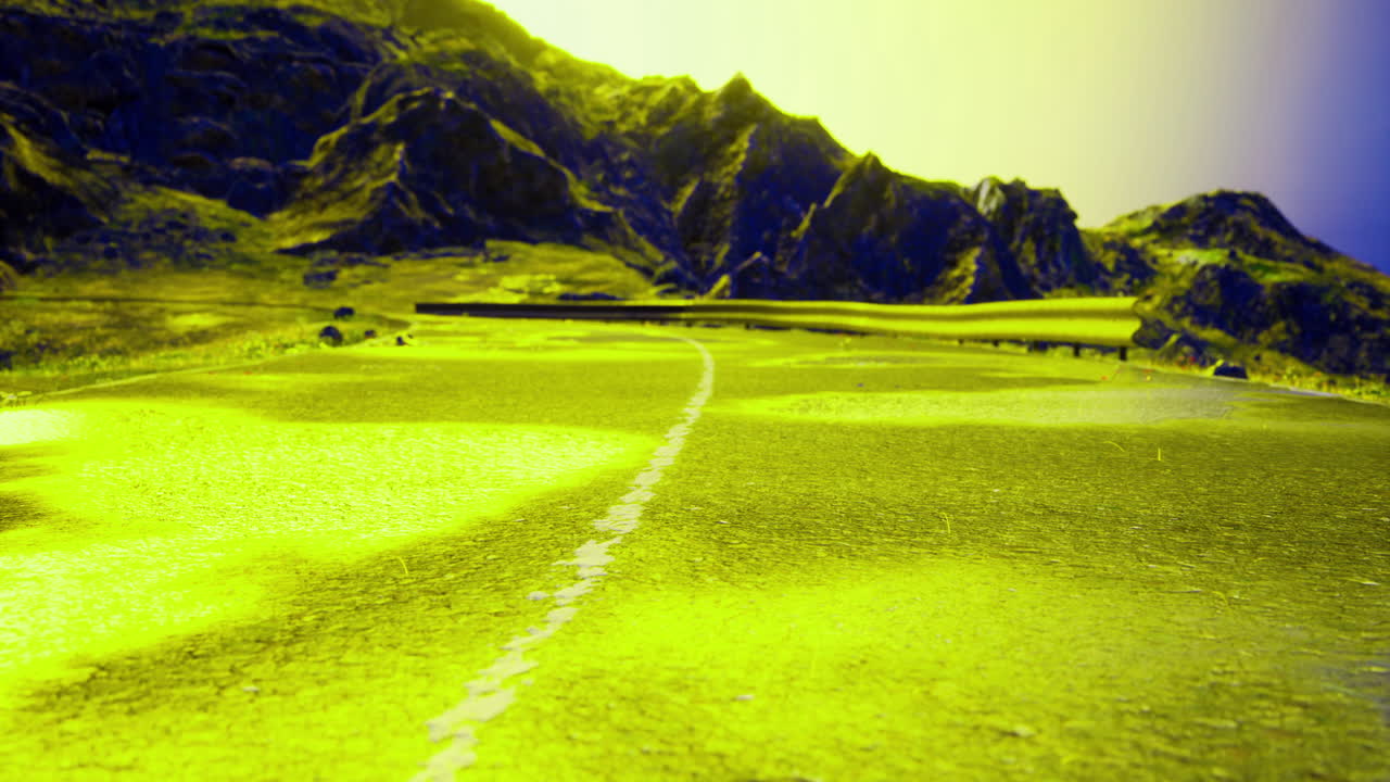 Vibrant landscape features winding road through glowing yellow terrain at dusk