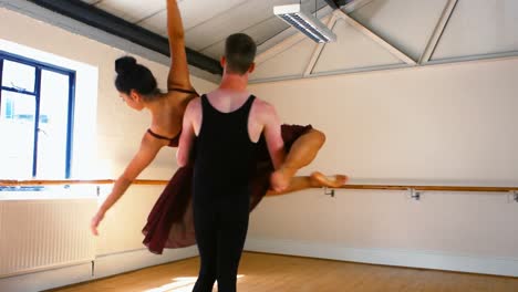 young couple practicing a ballet dance