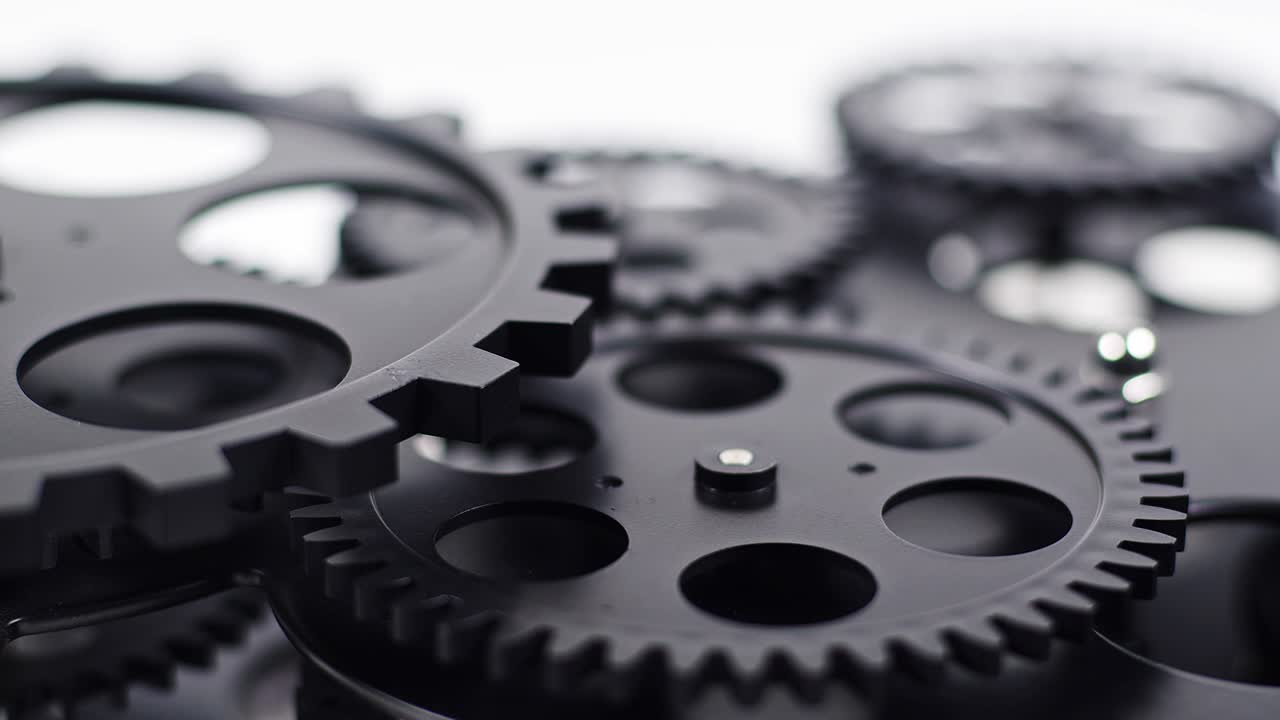Close Up Shot Of Black Gear Cogs Rotating