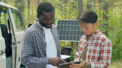 scientists using digital tablet