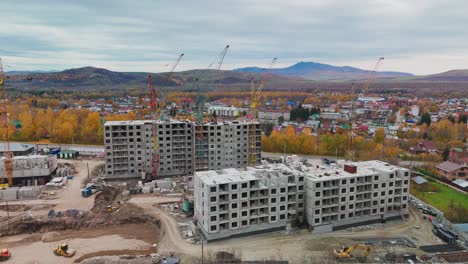 construction of apartment buildings in a city landscape