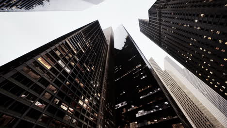 looking up at skyscrapers in a modern city