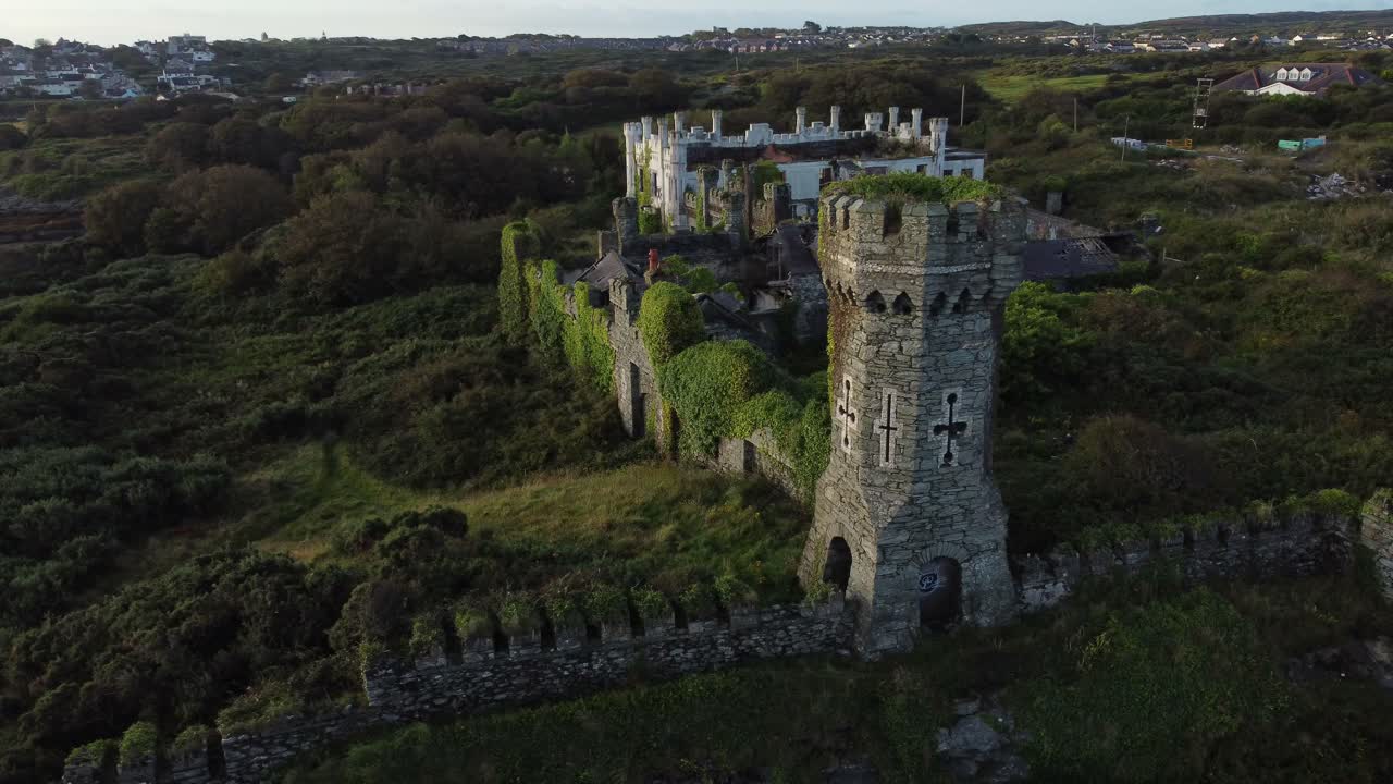 Soldiers point house aerial view orbiting overgrown abandoned Holyhead Victorian coastal castle