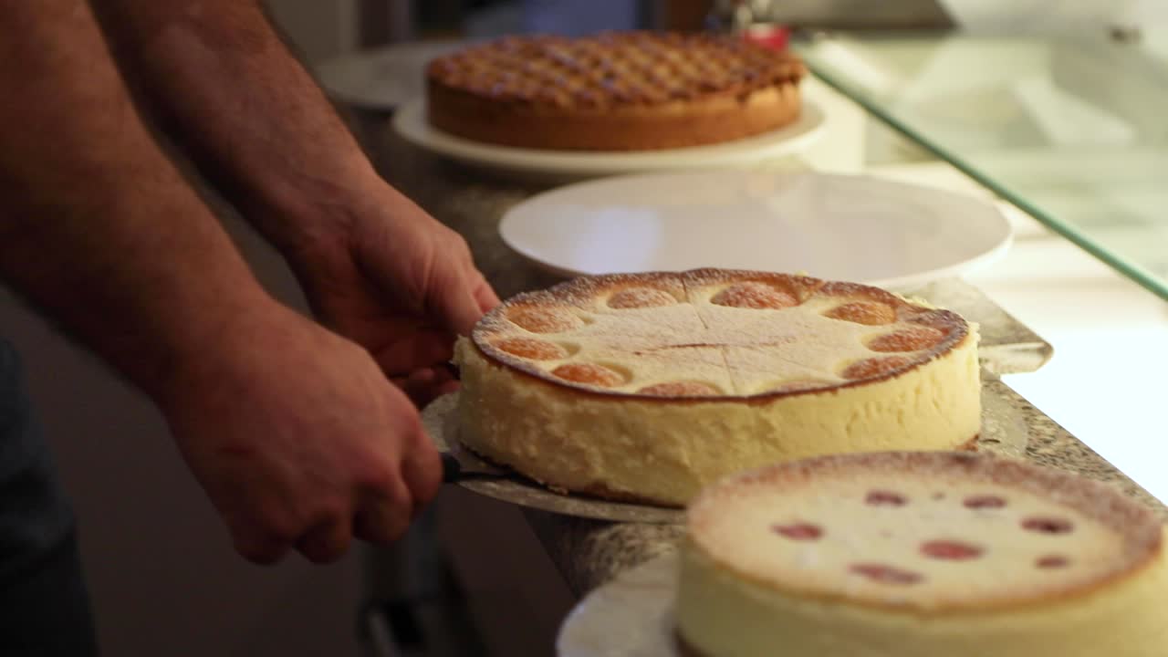 Freshly Baked Cake Placed On Porcelain Plate Prepared For Display On Bakeshop. - High Angle Shot