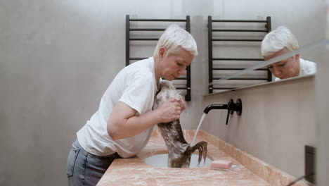 Woman-and-dog-at-the-bathroom