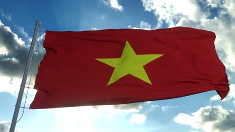 la bandera de vietnam ondeando en el viento contra el cielo azul profundo. 4k