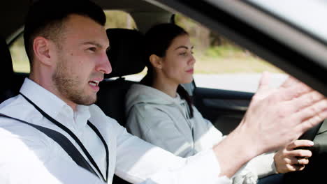 driving school teacher with student