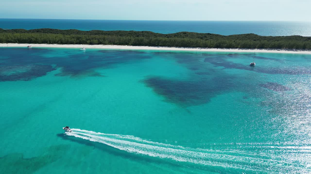 Take a look at Long Beach in the Bahamas from above! You can even spot a small boat passing by