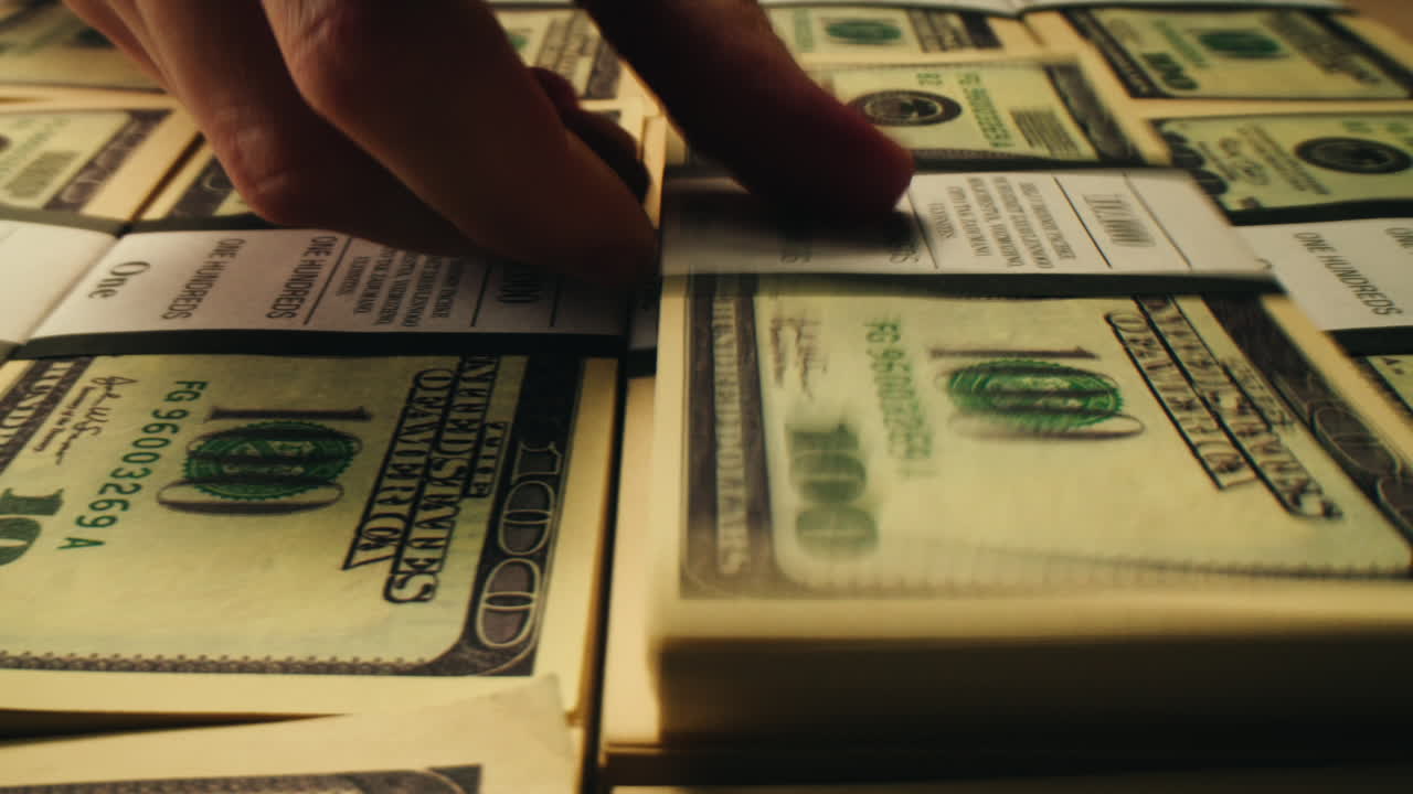 Specialised police officer Counting dollar banknotes in crime lab, conceptual image. High quality 4k footage