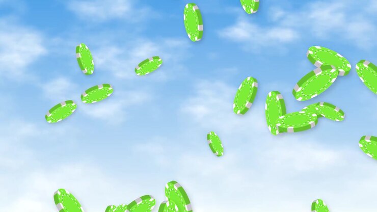 Animated green casino chips rain down against a bright blue sky with soft white clouds.