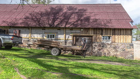 worker decorating old building with new planks, time lapse view