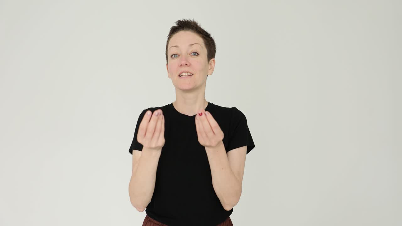 Woman making a money gesture