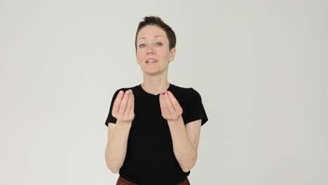 woman making a money gesture