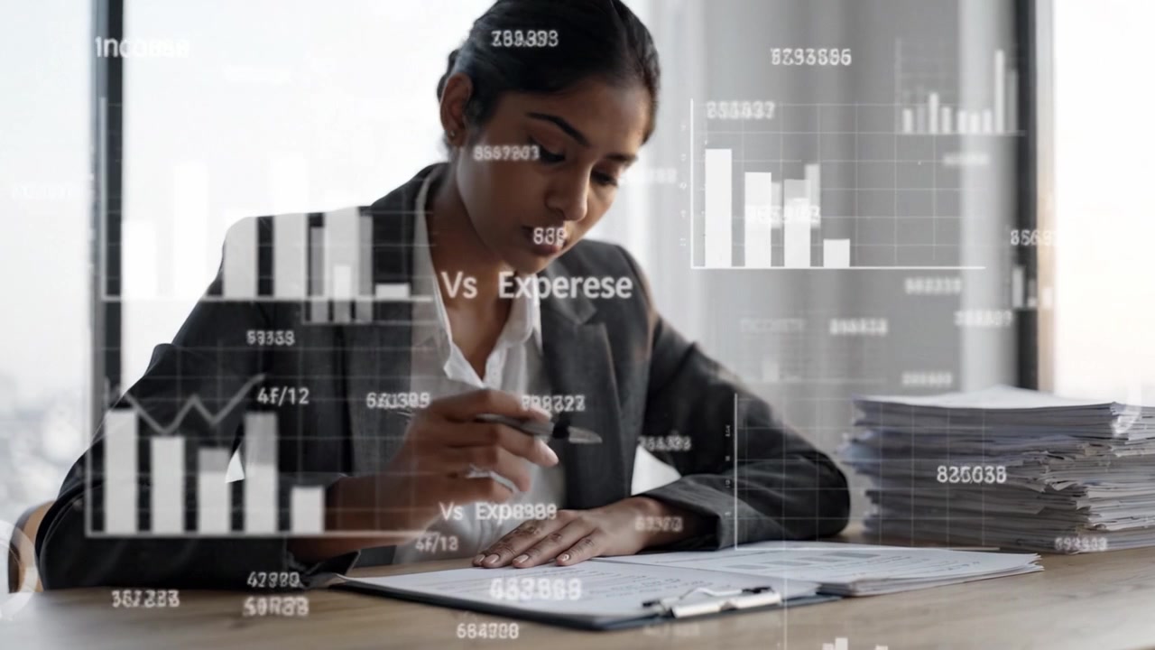 Focused Professional Analyzing Financial Data with Graphs and Tables While Writing Notes in a Modern Office Environment with Plenty of Papers Around