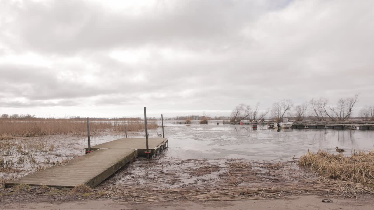 Low Tide Lake During Cloudy Day In Stockholm, Sweden