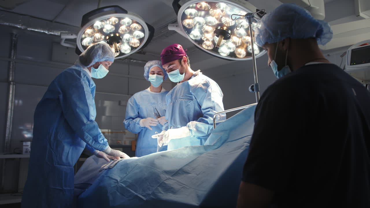 Surgeons and nurses during surgery