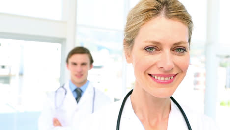 Young-doctors-smiling-at-camera