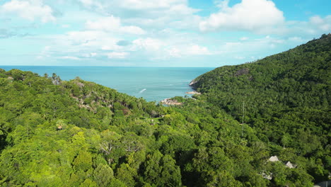 Aerial-Parallax-Showcasing-The-Beautiful-Coastal-Mountains-of-Koh-Tao-In-Thailand