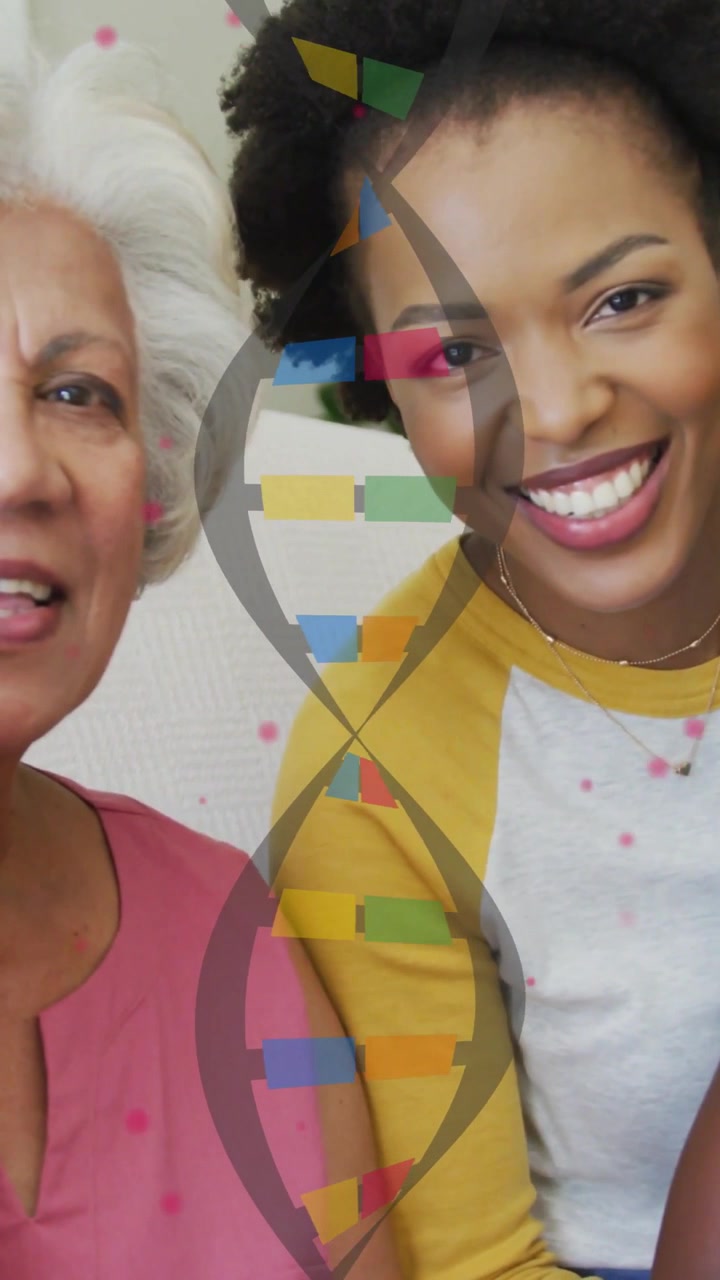 Mujeres mayores y de mediana edad sentadas, hélice de ADN apareciendo, puntos rosas flotando, generando sonrisas por la salud.