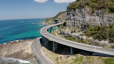 curvature road bridge by the steep valley - sea cliff bridge near wollongong in new south wales, australia