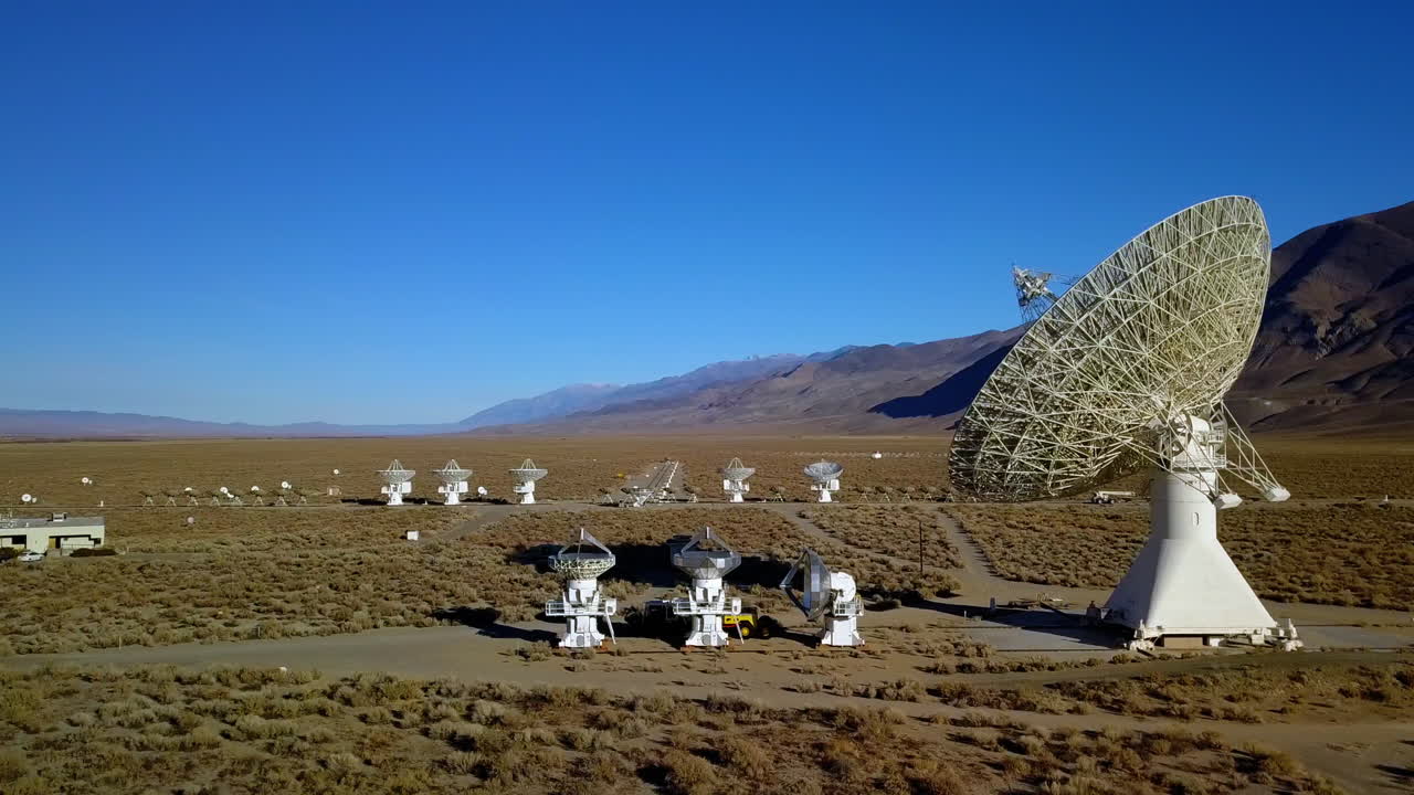 Aerial view around Sierra Mountain telescope dish, in USA - Orbit, drone shot