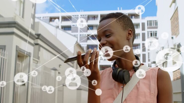 Animation of network of connection with icons over african american woman using smartphone