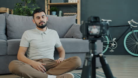 man vlogging at home