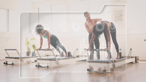 fitness data animation over women exercising on pilates reformers in bright studio