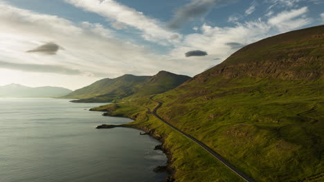 coastal mountain road at sunset