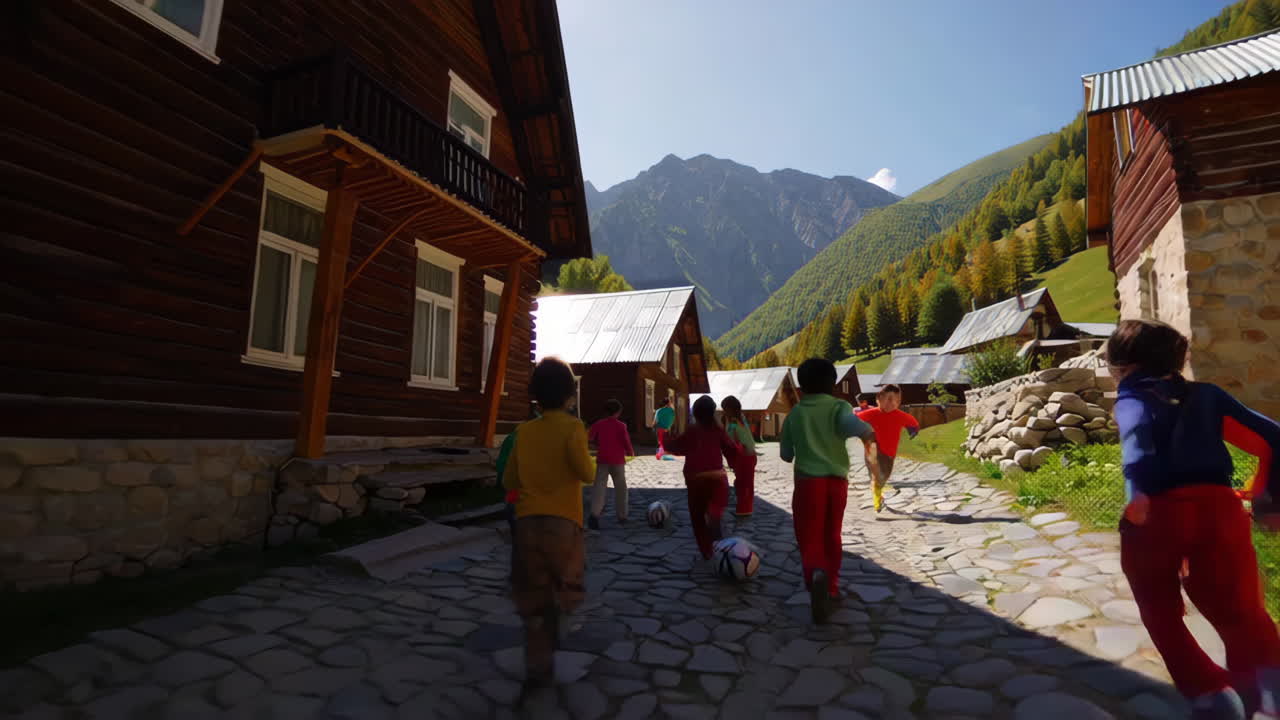 Children Playing Soccer in a Mountain Village