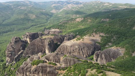 flying over unique rock formations in meteora, greece