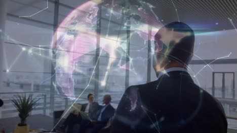 animation of globe and networks of connections over mixed race businessman in office