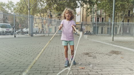 cute young child making bubbles