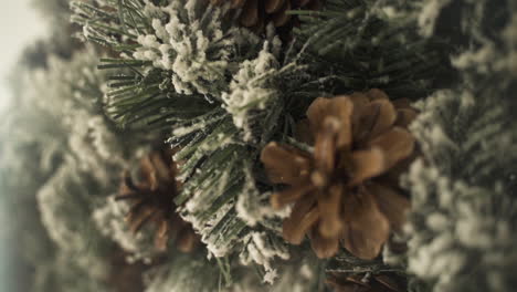 christmas advent wreath crown with pine cones - shallow focus close up