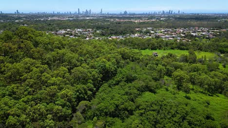 right to left aerial view over fox hill reserve looking towards surfers paradise, gold coast, queensland, australia